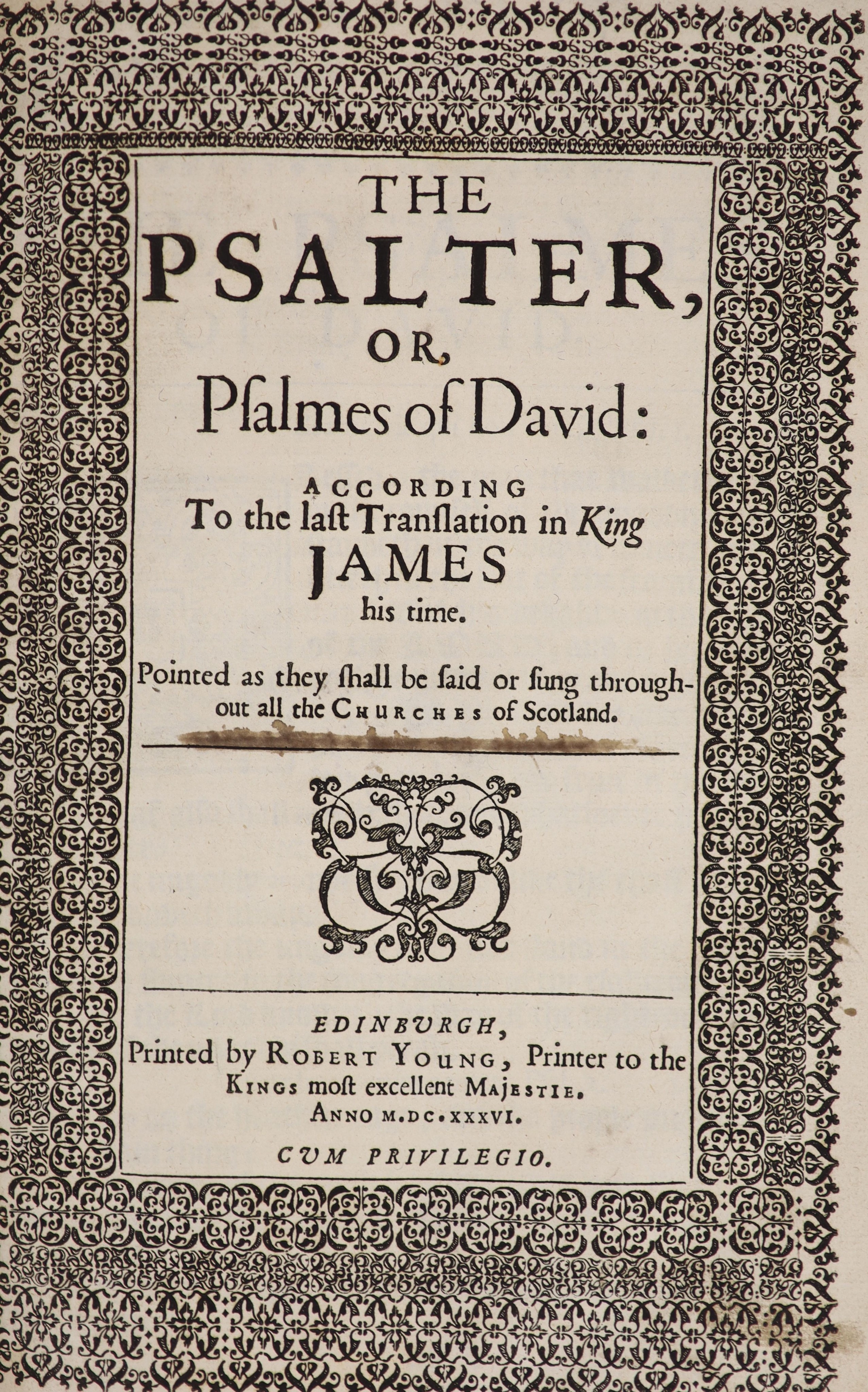 The Booke of Common Prayer ... for Use of the Church of Scotland. title (within an elaborate decorated border) printed in red and black with engraved device, head and tailpiece decorations